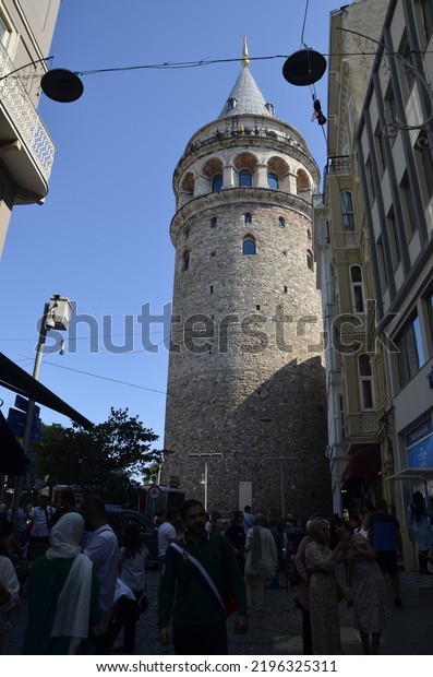 Istanbul, Beyoğlu, Turkey August 16.\
2022 : Galata tower, galata, historical tower and\
people.