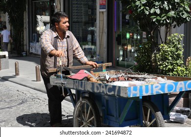 ISTANBUL, TURKEY - August 21, 2014. Tatter (junkman, Ragman) With The Tray Going On The Street, Istanbul, Turkey