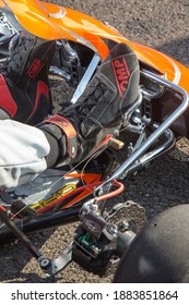 Istanbul, Turkey -August 5 2019 : Driver In Gear, Gloves And Helmet Drives A Racing Car. Go Kart In Action.