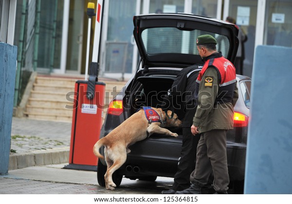 ISTANBUL,\
TURKEY - DECEMBER 28: Vehicles and cars that arrive in Silivri\
courthouse in Istanbul are searched by sniffer dogs and detectors\
on December 28, 2010 in Istanbul,\
Turkey.