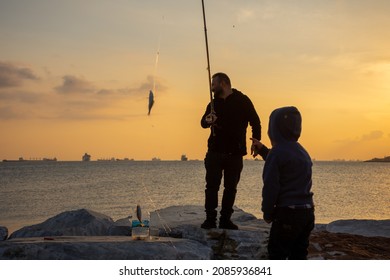 Istanbul Turkey; Family Fishing At Sunset On Samatya Beach. Happy Kids. 15 November 2021 