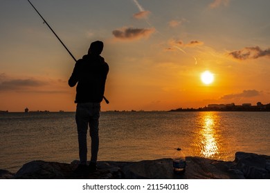 Istanbul Turkey; Family Fishing At Sunset On Samatya Beach. Happy Kids. 15 November 2021 