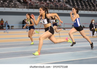 ISTANBUL, TURKEY - FEBRUARY 06, 2021: Athletes Running 60 Metres Hurdles During Turkish Indoor Athletics Championships