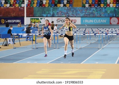 ISTANBUL, TURKEY - FEBRUARY 06, 2021: Athletes Running 60 Metres Hurdles During Turkish Indoor Athletics Championships