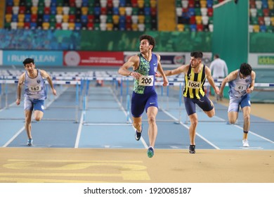 ISTANBUL, TURKEY - FEBRUARY 06, 2021: Athletes Running 60 Metres Hurdles During Turkish Indoor Athletics Championships