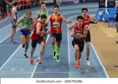 ISTANBUL, TURKEY - FEBRUARY 15, 2020: Athletes Running 4x400 Relay Race During Balkan Athletics Indoor Championships