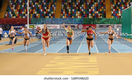 ISTANBUL, TURKEY - FEBRUARY 16, 2020: Athletes Running 60 Metres Hurdles During ​Istanbul Athletics Cup