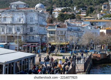 Istanbul, Turkey - February 2020: Büyükada Pier, People Enter The Big Island From The Pier. View Of The Büyükada Landscape In The Background.