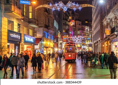 ISTANBUL, TURKEY - February 22: Nostalgic Tramway On The Main Pedestrian Taksim Istiklal Street At Late Evening On February 22, 2015 In Istanbul, Turkey