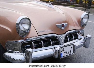 Istanbul, Turkey - February 26, 2022 : A vintage but in good condition Studebaker, which is an American Classic Car was parked on The Galata Bridge in Istanbul.