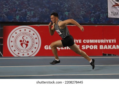 ISTANBUL, TURKEY - FEBRUARY 26, 2022: Undefined Athlete Running During Turkish Indoor Athletics Championships In Atakoy Athletics Arena