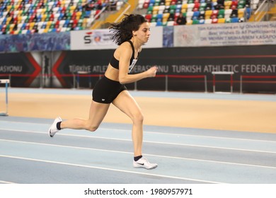 ISTANBUL, TURKEY - FEBRUARY 27, 2021: Undefined athlete running 60 metres hurdles during Turkish Athletic Federation Olympic Threshold Competitions