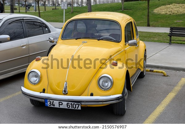 ISTANBUL, TURKEY -\
FEBRUARY 27, 2022: Vintage car Volkswagen Beetle (Volkswagen Bug)\
on the street.