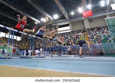 ISTANBUL, TURKEY - FEBRUARY 28, 2021: Athletes Running 60 Metres Hurdles During Turkish Athletic Federation Cup