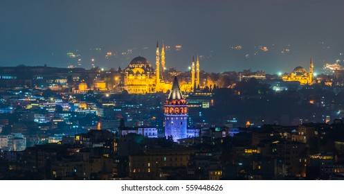 Istanbul, Turkey. Galata Tower and Suleymaniye Mosque at night. 