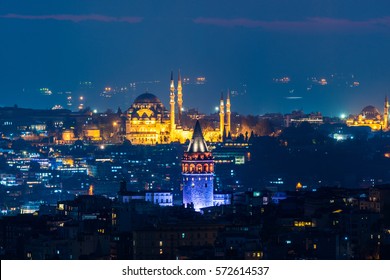 Istanbul, Turkey. Galata Tower and Suleymaniye Mosque at night. 
