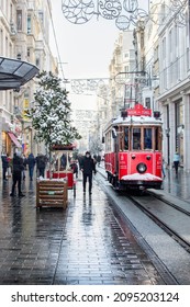ISTANBUL, TURKEY - JANUARY 18, 2021: one snowy day and Nostalgic tram on popular tourist place - Istiklal street, Beyoglu district, Taksim, Istanbul. Snow in Istanbul.