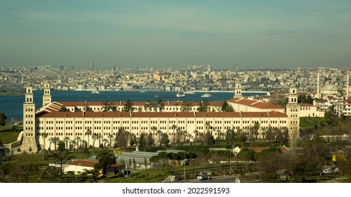 Istanbul, Turkey - January 22, 2021: View of Istanbul Selimiye Barracks, Bosphorus and Istanbul cityscape. Selimiye Barracks is a historical structure. Panoramic shot, blue sky background. 
