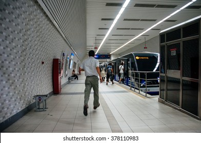 ISTANBUL, TURKEY - JUL 28, 2009: Man Running Trying To Catch The Istanbul Metro Train At Kabatas Station. It Is The World's Second-oldest Underground Urban Rail Line After The London Underground