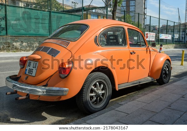 ISTANBUL, TURKEY - JULY
13, 2022: Vintage car orange Volkswagen Beetle (Volkswagen Bug) on
the street.