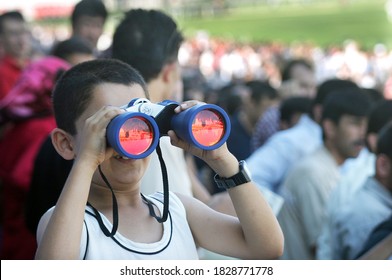 ISTANBUL, TURKEY - JULY 20: Turkish Horse Racing Fans Watching The Horse Race At The Tribune In Veliefendi Hippodrome On July 20, 2005 In Istanbul, Turkey.