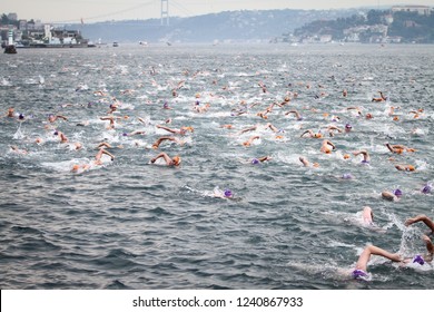 ISTANBUL, TURKEY - JULY 22, 2018: Swimmers swim during Samsung Bosphorus Cross Continental Swimming Competition in Bosphorus Strait.