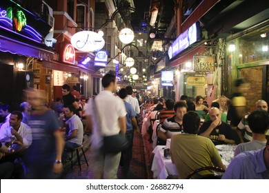 ISTANBUL, TURKEY - JULY 25 : Busy Restaurant And Bar Scene At Night In Taksim, Istanbul, Turkey On July 25, 2007. Taksim Is A Popular Destination For Tourists And Locals Of Istanbul.