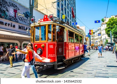 ISTANBUL, TURKEY - JUNE 2, 2019: Old-fashioned Red Tram At Taksim Square - The Most Popular Destination In Istanbul. Nostalgic Tram Is The Heritage Tramway