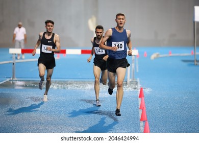 ISTANBUL, TURKEY - JUNE 23, 2021: Athletes Running 3000 Metres Steeplechase During Turkish Athletic Federation Cezmi Or Cup