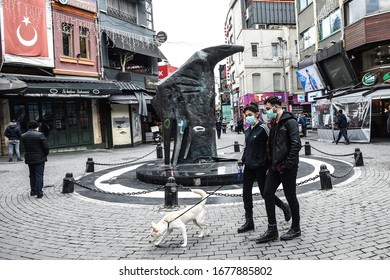 ISTANBUL, TURKEY - MARCH 19, 2019: People Are Wearing Protective Masks On Street In Istanbul. Coronavirus Has Killed More Than 300 People In China.