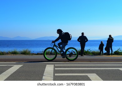 Istanbul / Turkey March 21, 2020 On The Beach Bike Ride, People Clean Air