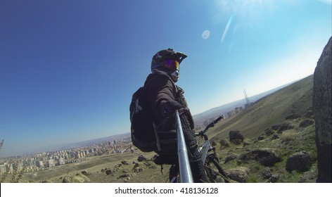 Istanbul, Turkey - March 22, 2014: Man Preparing For Downhill With His Mountain Bike Gopro Image