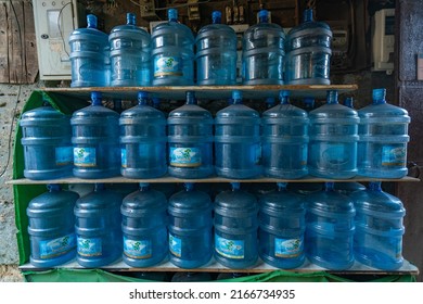 ISTANBUL, TURKEY - March 28, 2022: Empty water bottles with a capacity of 19 litres (5 gal - 640 fl oz) stacked on shelves. 