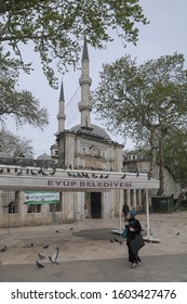 Istanbul, Turkey - May 05, 2009: Urban scene next to the Sultan Eyup Mosque in a populous city neighborhood