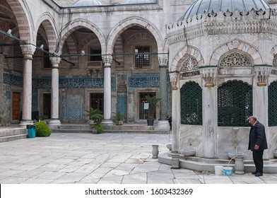 Istanbul, Turkey - May 05, 2009: Scene in the inner courtyard of the New Mosque or Yeni Cami in the historic city center