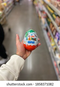 ISTANBUL, TURKEY - MAY 11 2019:  Kinder Surprise Maxi Holding In Hand At Supermarket For Sale.