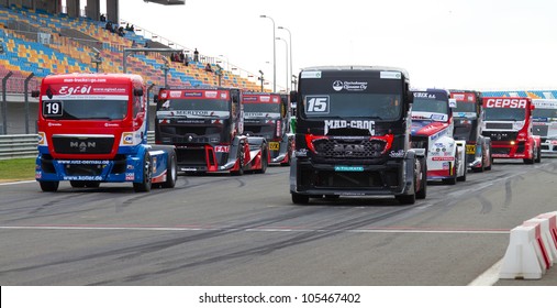 ISTANBUL, TURKEY - MAY 12: Dominique Lacheze (19), Mika Makinen (15) and other drivers at start grid before 2nd Race of FIA European Truck Racing Championship on May 12, 2012 in Istanbul, Turkey.