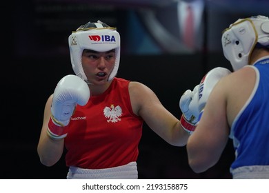 ISTANBUL, TURKEY - MAY 19, 2022: Toborek Oliwia (Red) And Stonkute Gabriele (Blue) Compete During IBA Womens World Boxing Championships