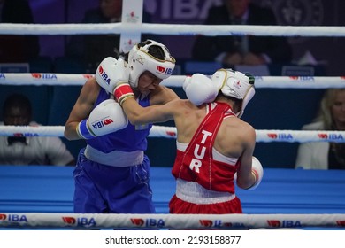 ISTANBUL, TURKEY - MAY 19, 2022: Cagirir Ayse (Red) And Balkibekova Alua (Blue) Compete During IBA Womens World Boxing Championships