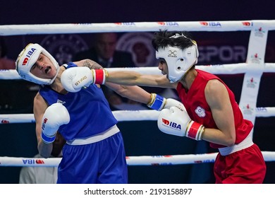 ISTANBUL, TURKEY - MAY 19, 2022: Lin Yu-Ting (Red) And Testa Irma (Blue) Compete During IBA Womens World Boxing Championships