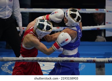 ISTANBUL, TURKEY - MAY 19, 2022: Cagirir Ayse (Red) And Balkibekova Alua (Blue) Compete During IBA Womens World Boxing Championships