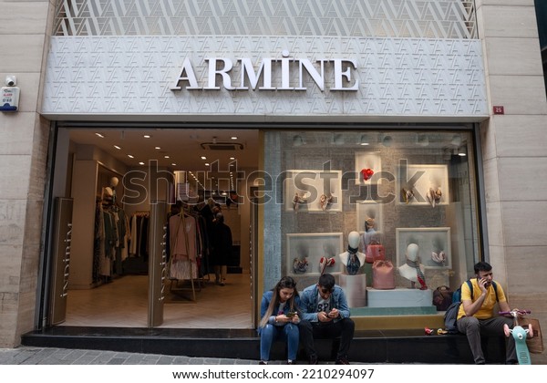 ISTANBUL, TURKEY - MAY 22,\
2022: Logo of Armine Fashion on their reseller in Istanbul. Armine\
is a Turkish fashion retailer specialized in Muslim modest\
clothing.\
\
