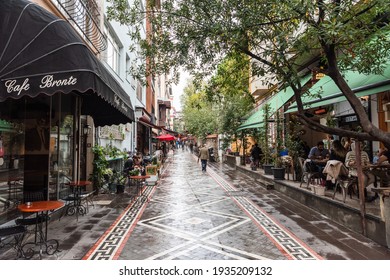 Istanbul, Turkey – November 15, 2020. Ali Suavi Sokak street in Kadikoy neighborhood of Istanbul. View with commercial properties and people, on a cloudy day.