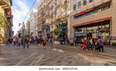 ISTANBUL TURKEY, NOVEMBER 27, 2021: People walking in Istiklal street, one of the attraction center by historical buildings restaurants and shops, urban cityscape, daily life, Beyoglu european side