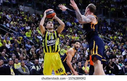 ISTANBUL / TURKEY, NOVEMBER 28, 2019: Kostas Sloukas shooting over Janis Timma during EuroLeague 2019-2020 Round 11 basketball game between Fenerbahce Beko and Khimki Moscow at Ulker Sports Arena.