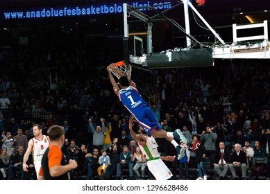 Istanbul / Turkey - November 30, 2018: Rodrigue Beaubois Hanging The Rim After The Dunk During EuroLeague 2018-19 Round 10 Basketball Game Anadolu Efes Vs Baskonia Vitoria At Sinan Erdem Dome.