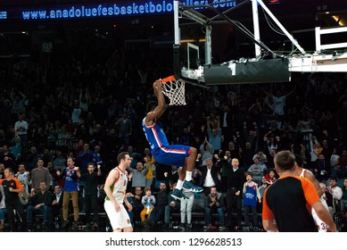 Istanbul / Turkey - November 30, 2018: Rodrigue Beaubois Hanging The Rim After The Dunk During EuroLeague 2018-19 Round 10 Basketball Game Anadolu Efes Vs Baskonia Vitoria At Sinan Erdem Dome.