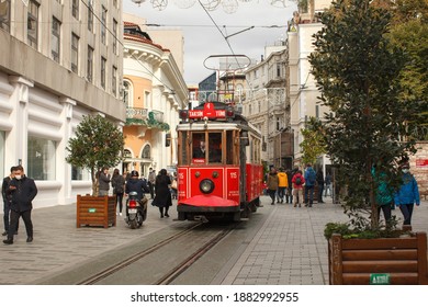 ISTANBUL, TURKEY - NOVEMBER 30, 2020: Historical Red Tram Driver With Medical Face Mask