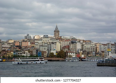 Istanbul, Turkey - November 5th, 2018: View of the Anatolian Istanbul buildings  from the Eminou Pier in an autumn cloudy day.