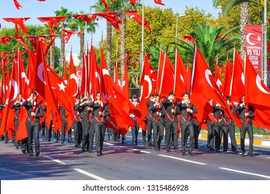 ISTANBUL, TURKEY - OCTOBER 29, 2018: parade of the armed forces of Turkey in honor of the Republic Day. School students are marching with flag to show power and military strength of the Turkey.